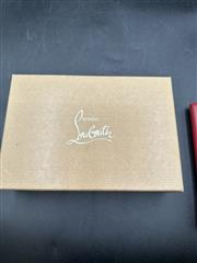 CHRISTIAN LOUBOUTIN POCHETTE WRISTLET